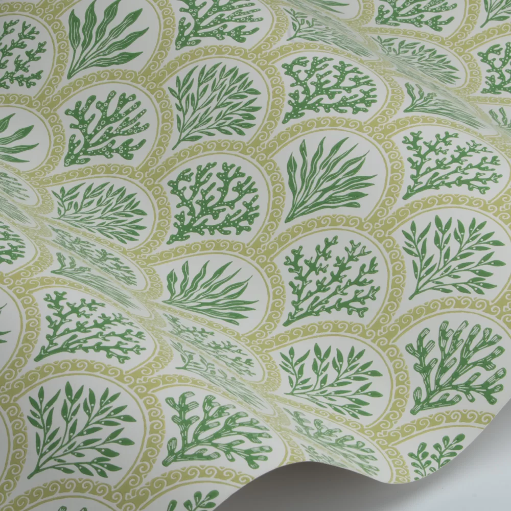 A sea coral themed wallpaper in green and mustard colours.